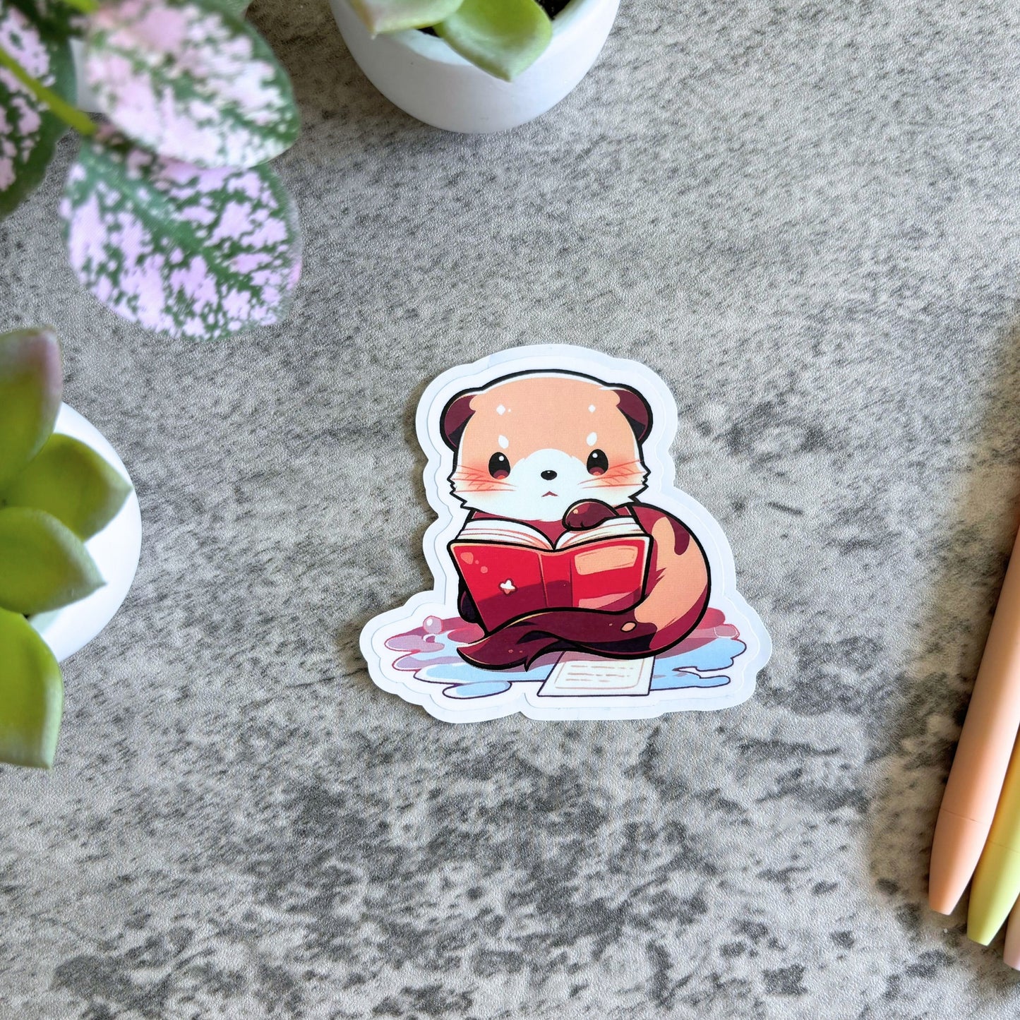 Otter Studying Sticker