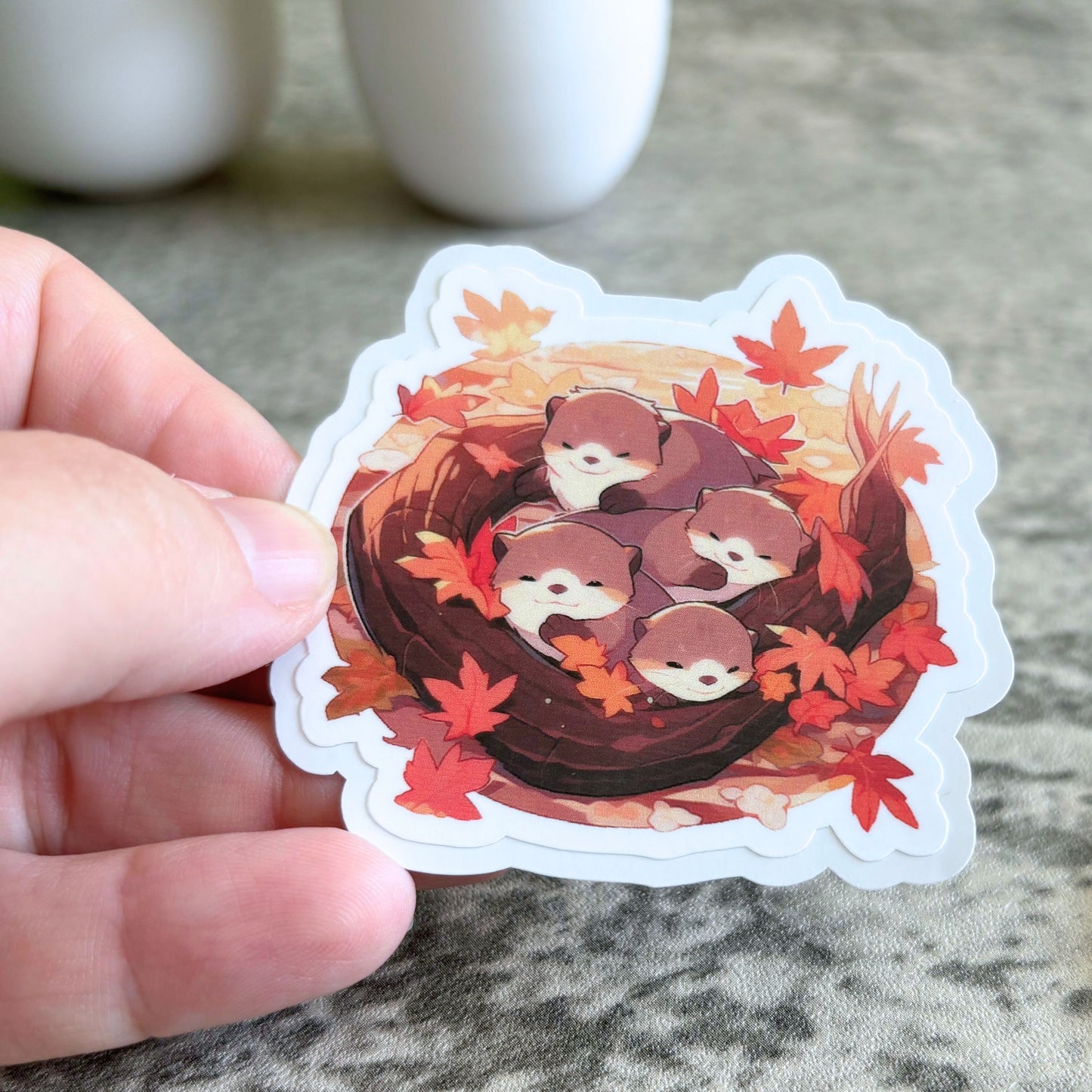 Snuggling Otters Sticker