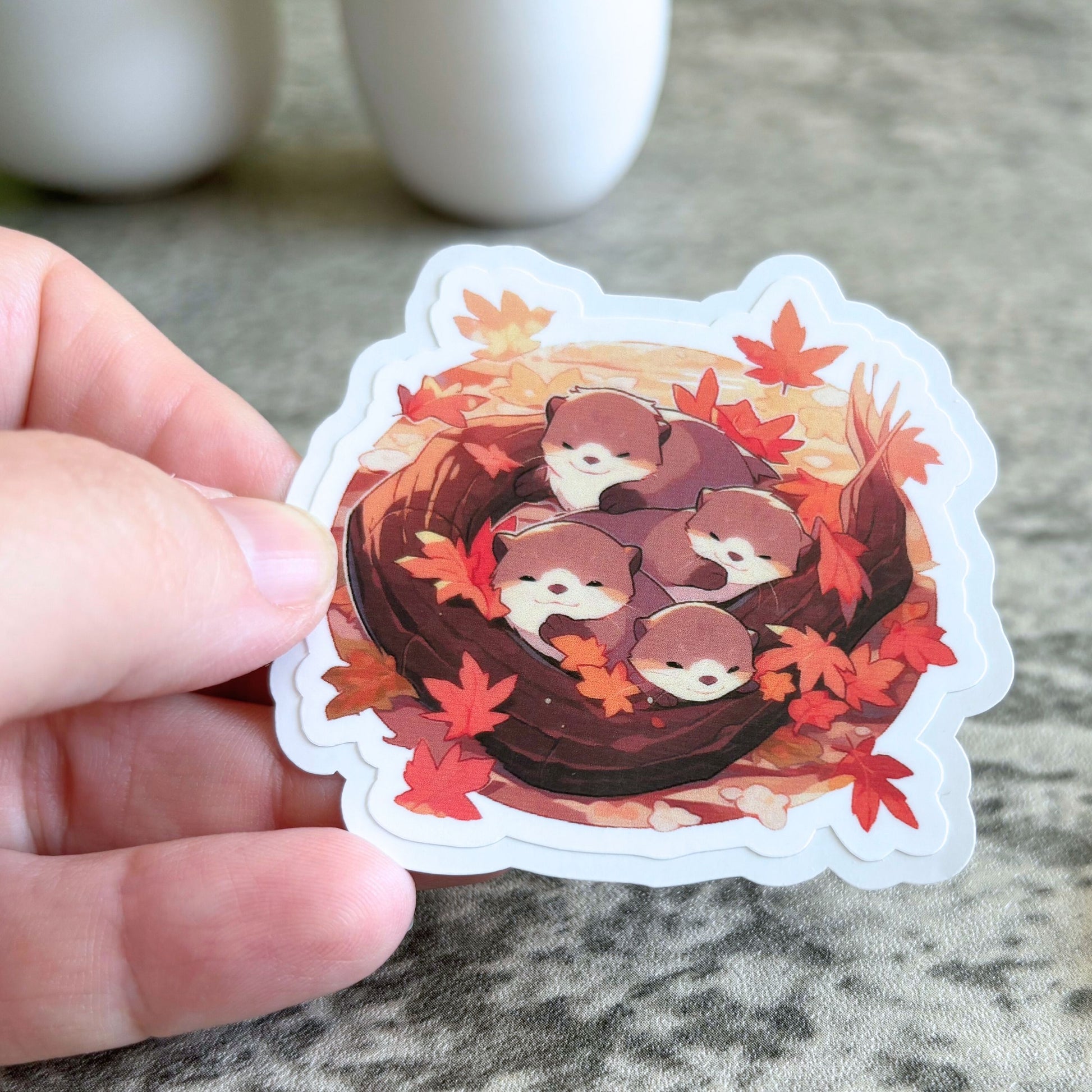 Snuggling Otters Sticker